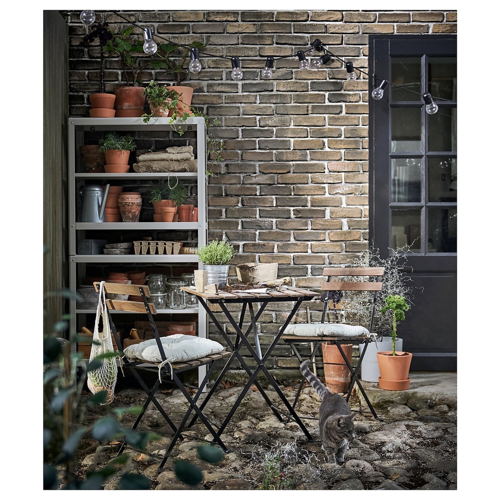 TÄRNÖ Chair, outdoor - foldable black/light brown stained
